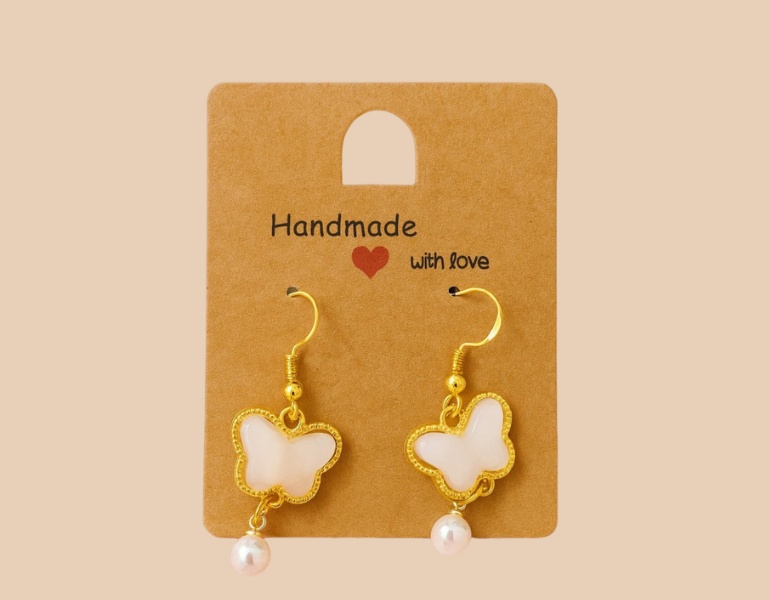 In tag bông tai vintage